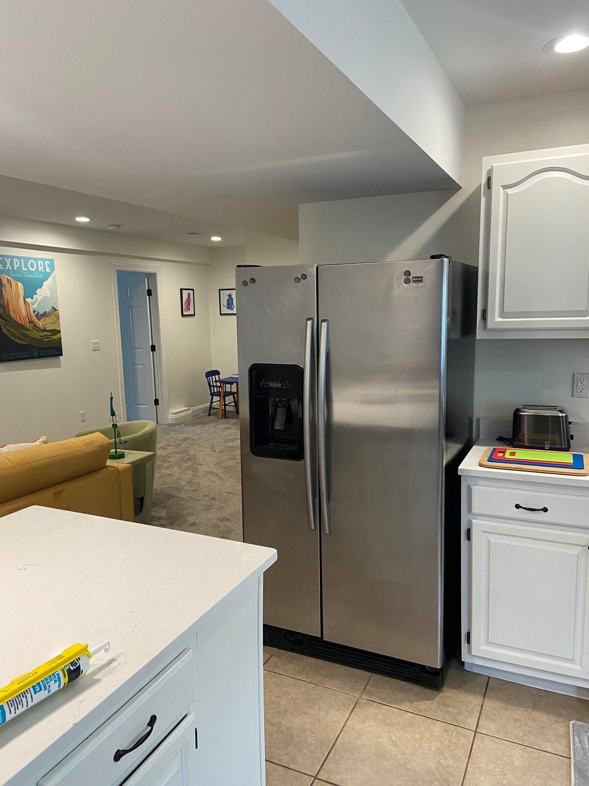 Modern kitchen with stainless steel fridge