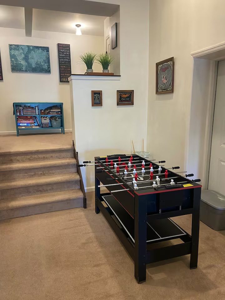 Wall art and foosball table setup