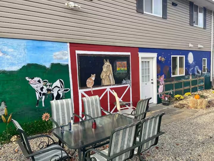Farm-themed mural on building wall