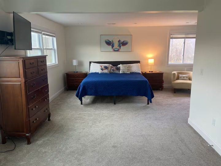 Cozy bedroom with wooden furniture